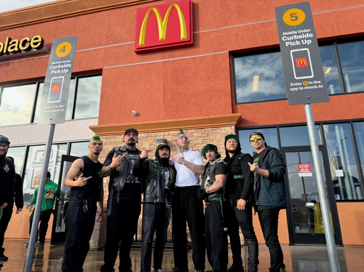 Knuckleheadz pose in front of a McDonald's.