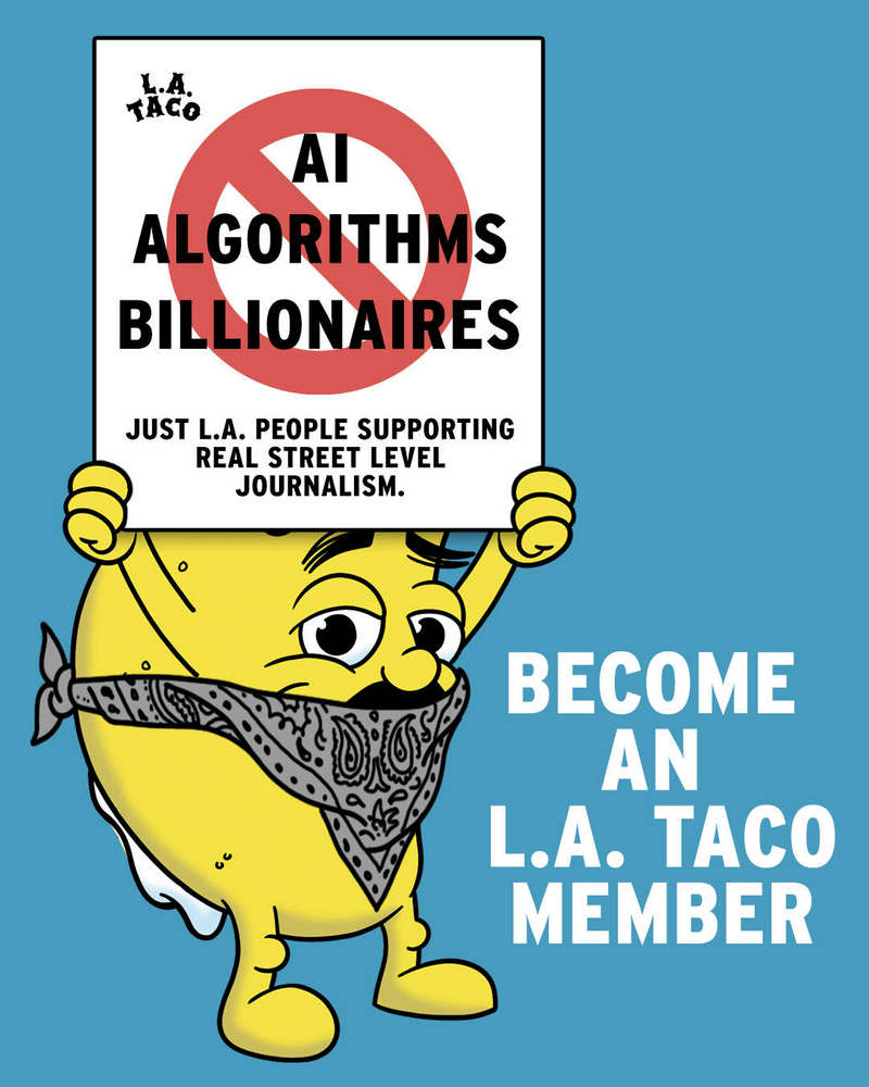 L.A. TACO's world-famous Tacoman, bandannaed-up and holding a sign that says AI Algorithims Billionaires, which are all crossed out