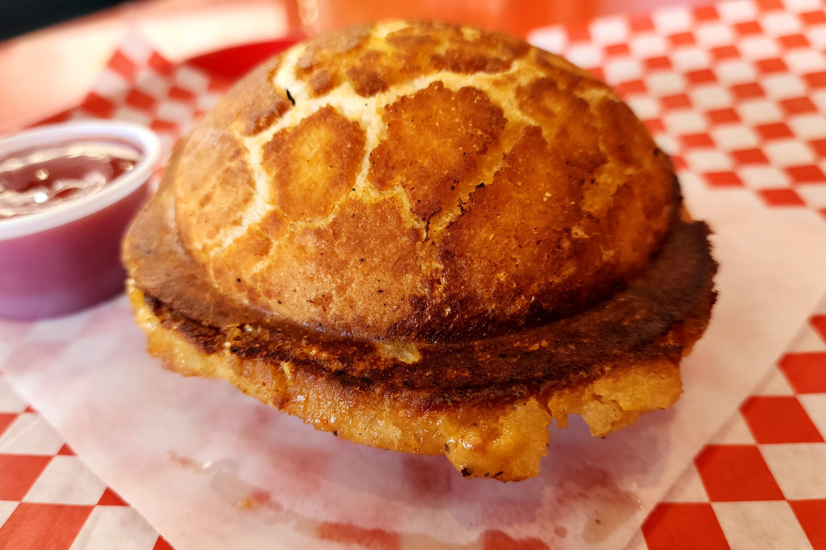 The Pocket Burger, a burger encased in is own bun, at The Mouth in Burbank