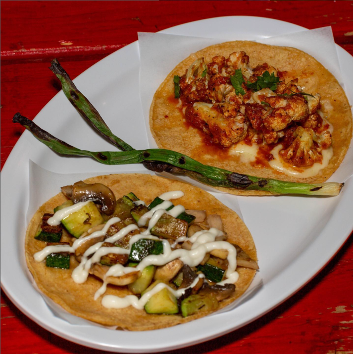 Two veggie tacos from Mexicali Taco with zucchini, mushroom and cauliflower .