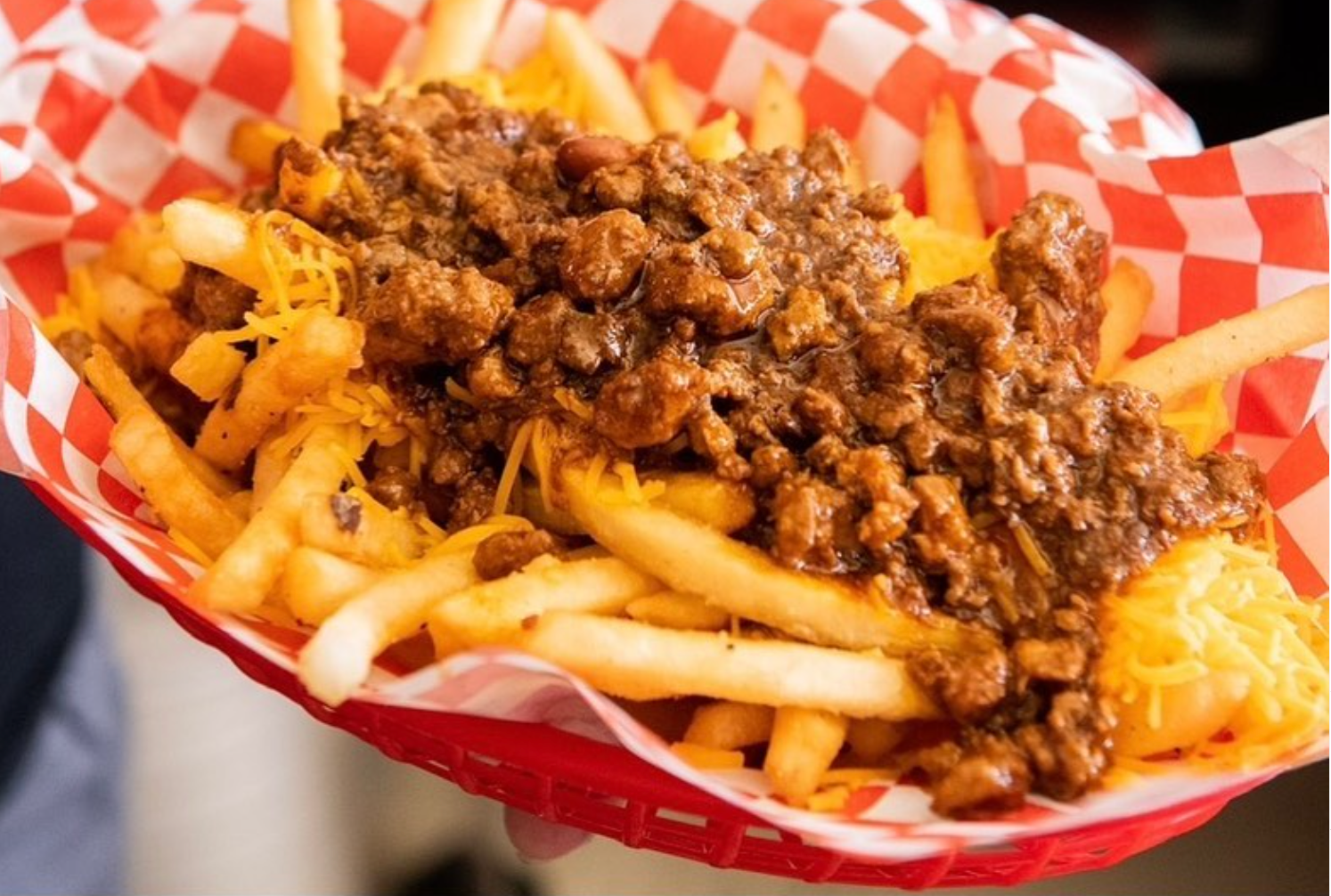 Fries covered in Chili John's chili cheese.