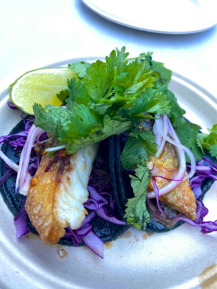 Dry-aged taco from Anajak Thai topped with cilantro and purple cabbage.