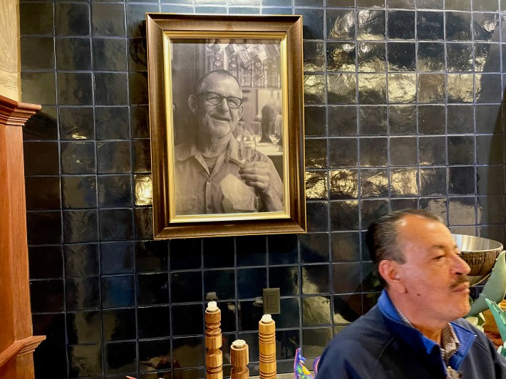 An altar to Tomas Estes is at Ocho's distillery's bar.