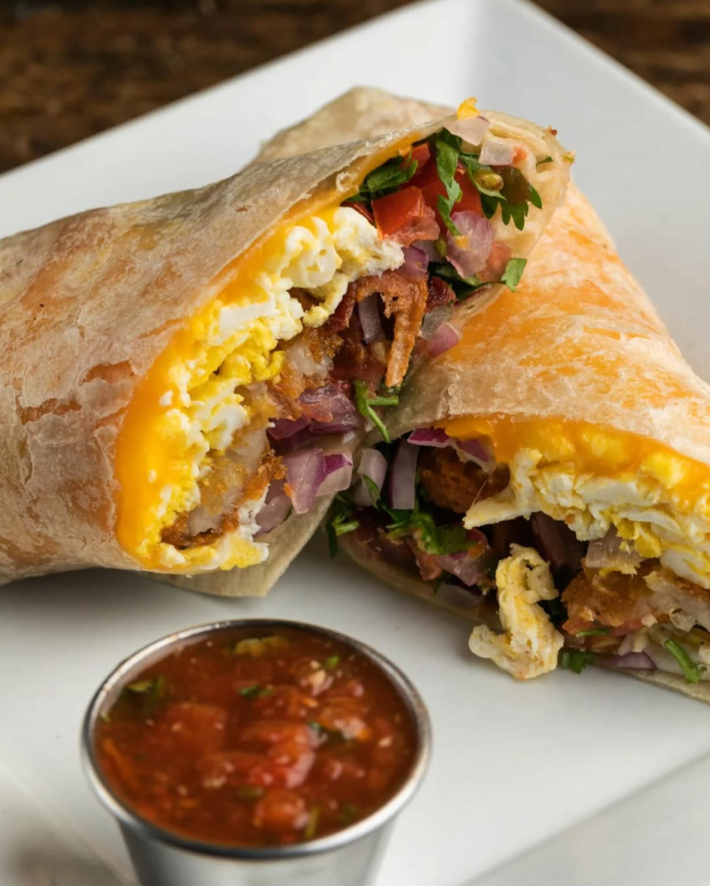 Fresh cracked egg, hashbrown, applewood smoked bacon, mexicheese blend, and pico de gallo wrapped in a flour tortilla.