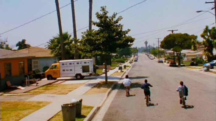 The opening shot of Friday on W 126th St. Screenshot via New Line Cinema.