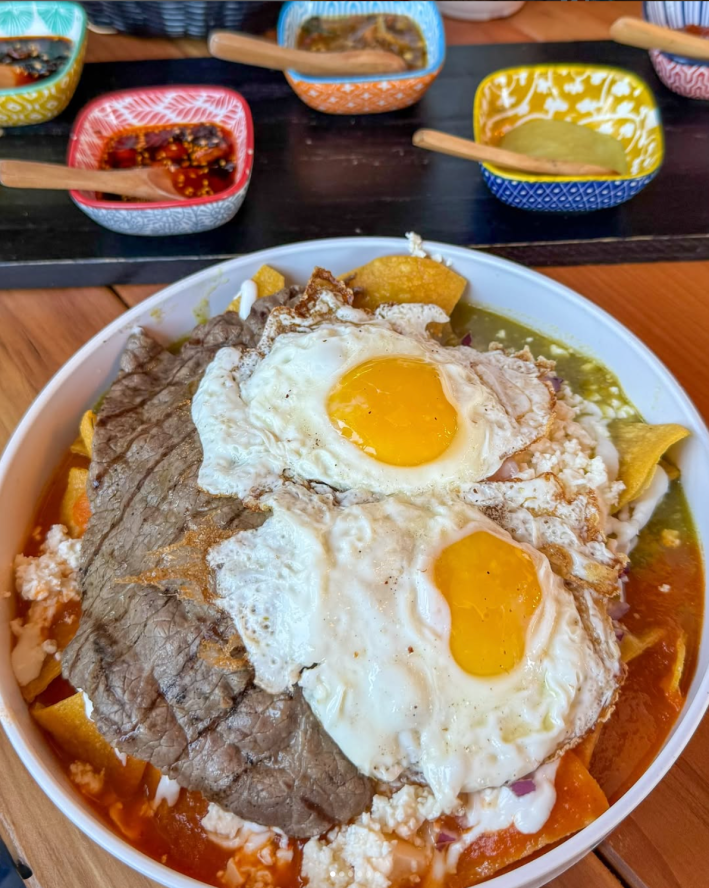 chilaquiles divorciados, with half green and red salsa.