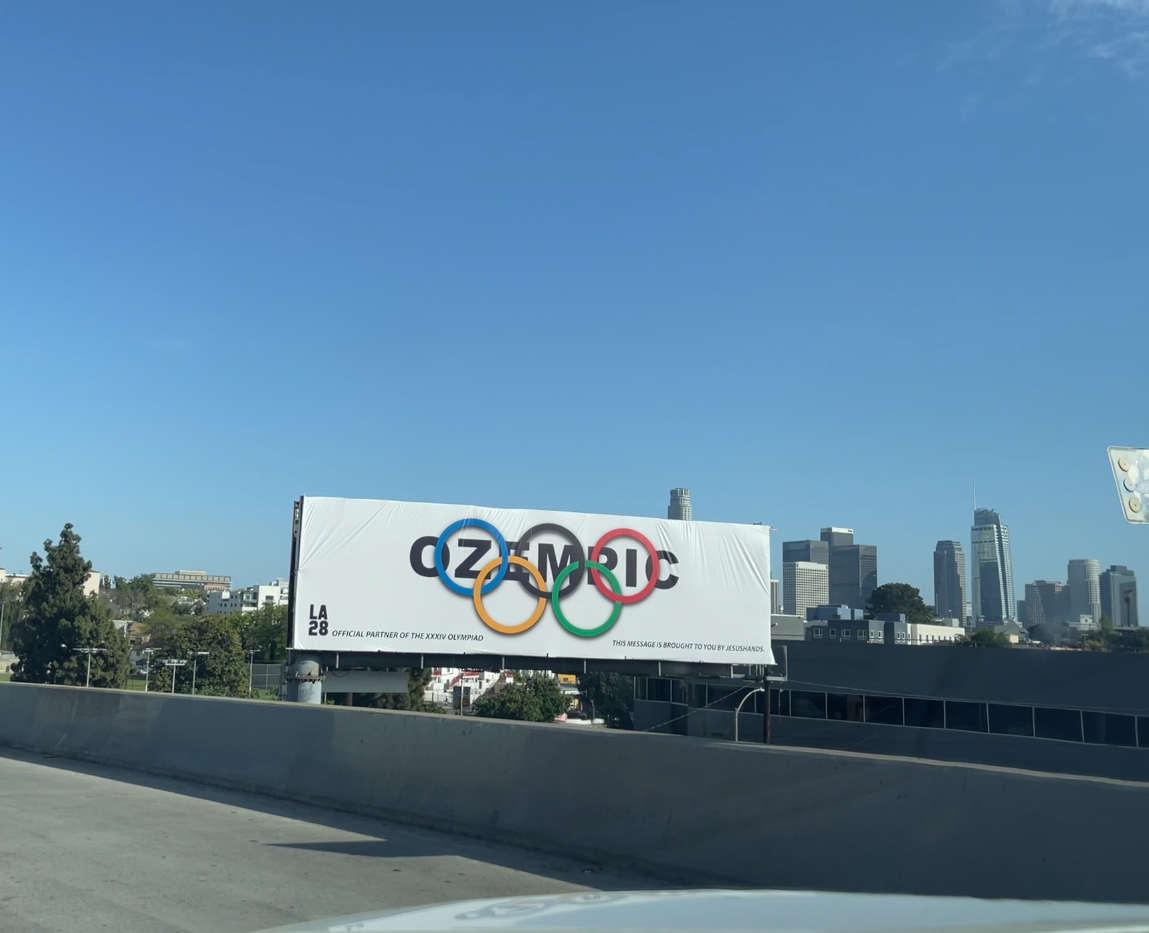 Ozempic billboard photographed from a car on the 101 Freeway.