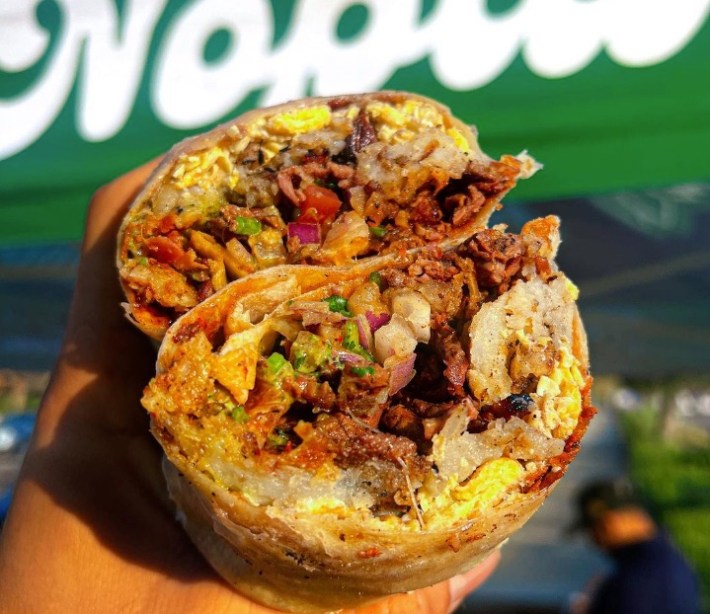 A loaded breakfast burrito from Taquería Nopal in the Valley.
