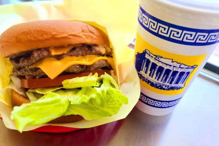 A classic double cheese burger with crunchy lettuce, tomato and onion.