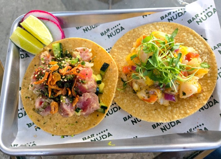 Sushi-grade ahi tuna tostada, left, and a mango-habanero shrimp tostada.
