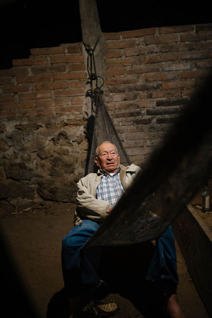 Japo resting in his hammock at this taberna, where his family makes his raicilla.