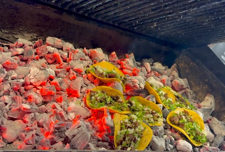 Tacos on the coals at Delfi's TJ Tacos.