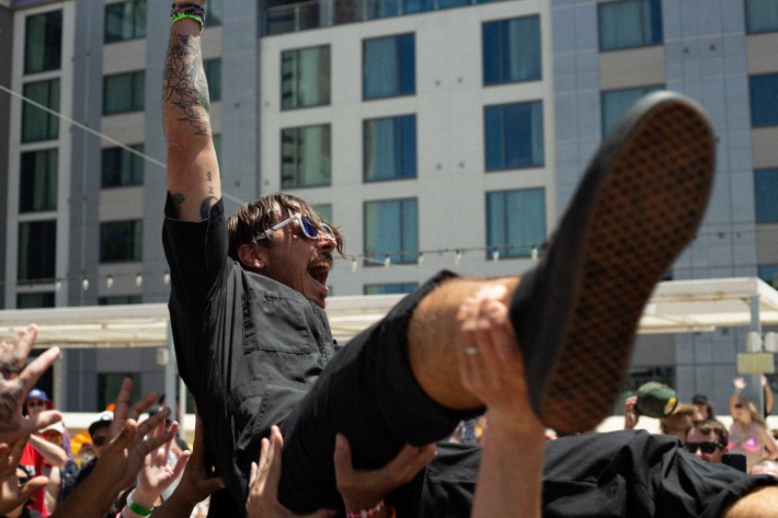 A fan crowdsurfing at Punk Rock Bowling 2024.