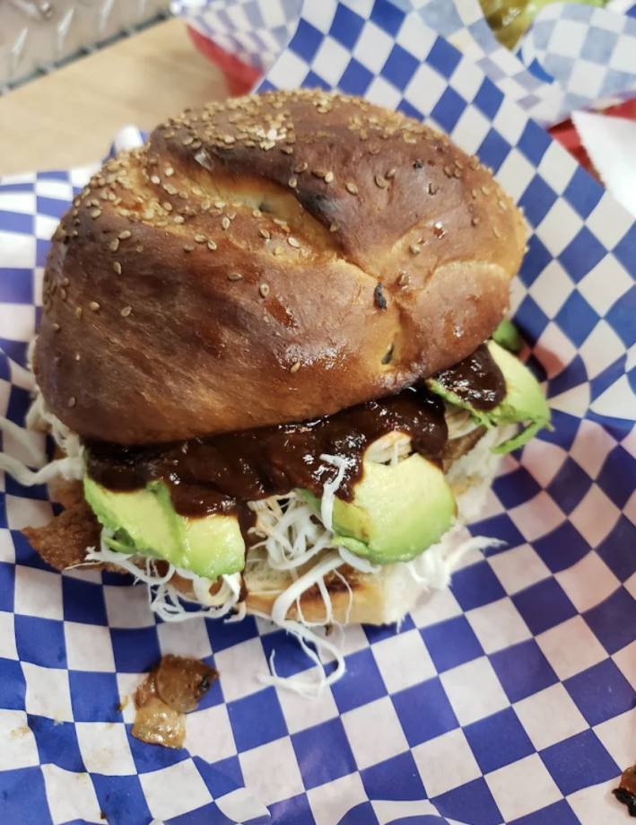 cemita with chipotle sauce and avocado.
