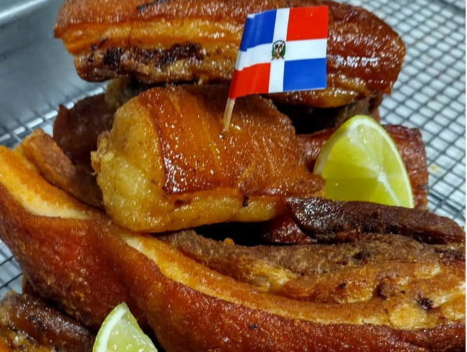Chicharron with a mini Dominican flag in one piece of meat
