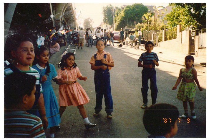 Kids rehearse for the mambo scene along 4th Street at the Lorena Street Bridge. Photo by Barbara Martinez Jitner.