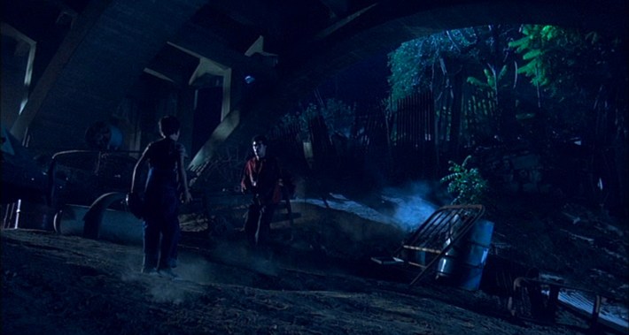 Chucho runs into his younger brother Jimmy (Jonathan Hernandez) while evading police.