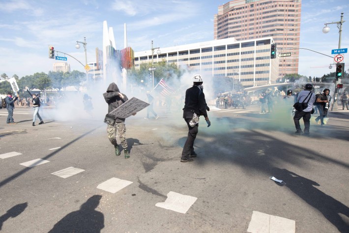 Police deploying tear gas on No Kings Day protest in downtown Los Angeles last Saturday.
