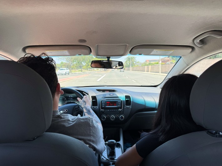The couple driving around Santa Ana.