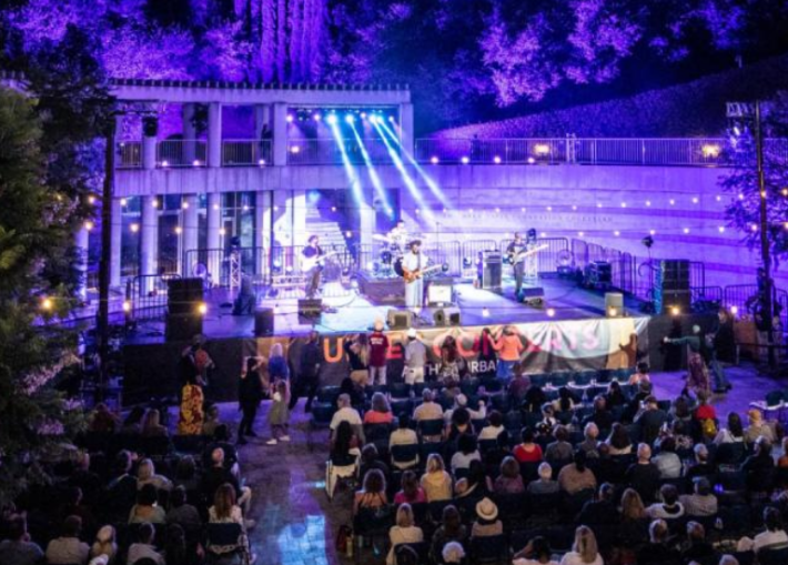 A crowd watches a show at the Skirball Center