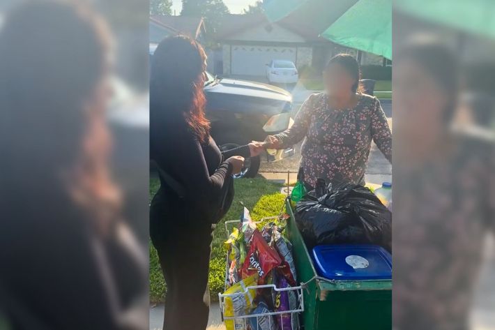 Marisol gifting the vendor a donation.