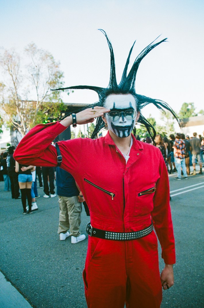 A lone jester fan salutes the camera.