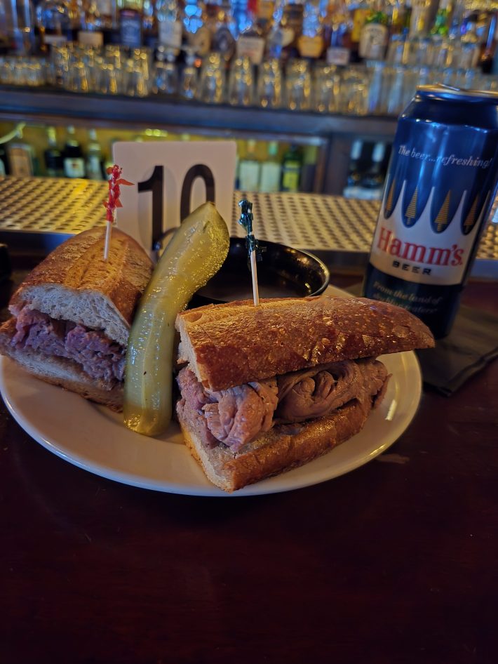 Cole's French Dip sandwich and a pickle.