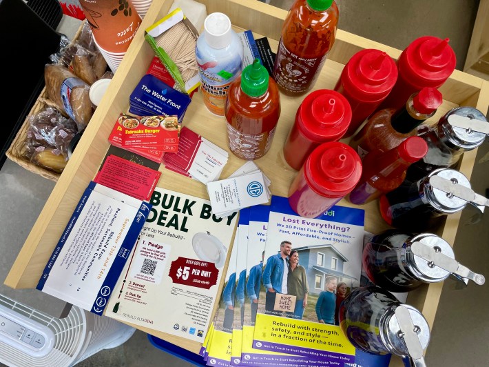 At Altadena Burger, the ketchup and pancake syrup are next to brochures to help residents rebuild their homes.