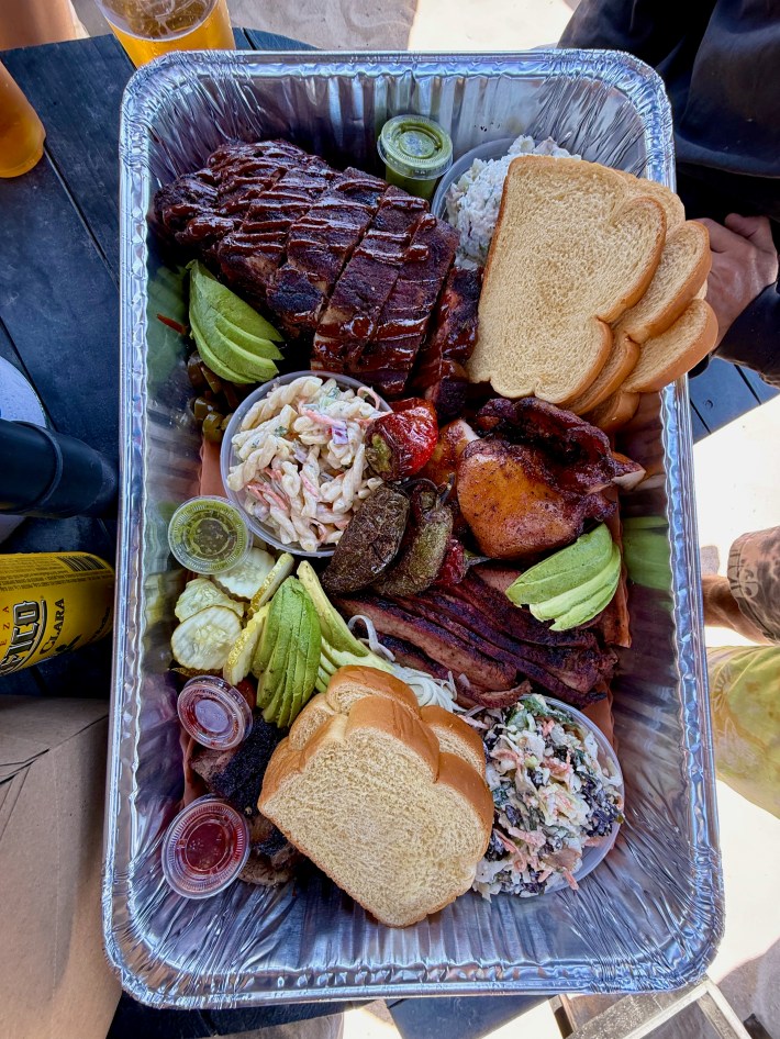 A plate of meats from Smokehouse by Heritage Barbecue in Bolsa Chica beach.