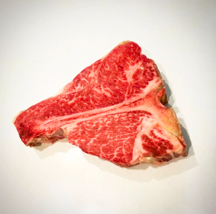 Marbleized raw meat.