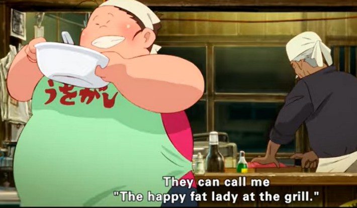 A still from "Fortune Favors Lady Nikuko," in which the title character carries a bowl from the kitchen, where a man works.