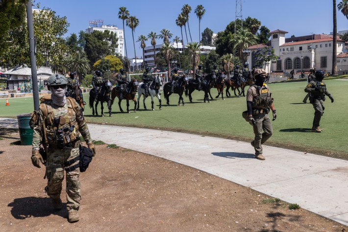 Federal agents descend on MacArthur Park in Los Angeles on July 7, 2025.