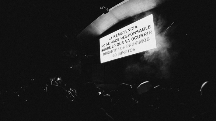 The crowd gathers as La Resistencia sets up in MacArthur Park on August 16, 2025.