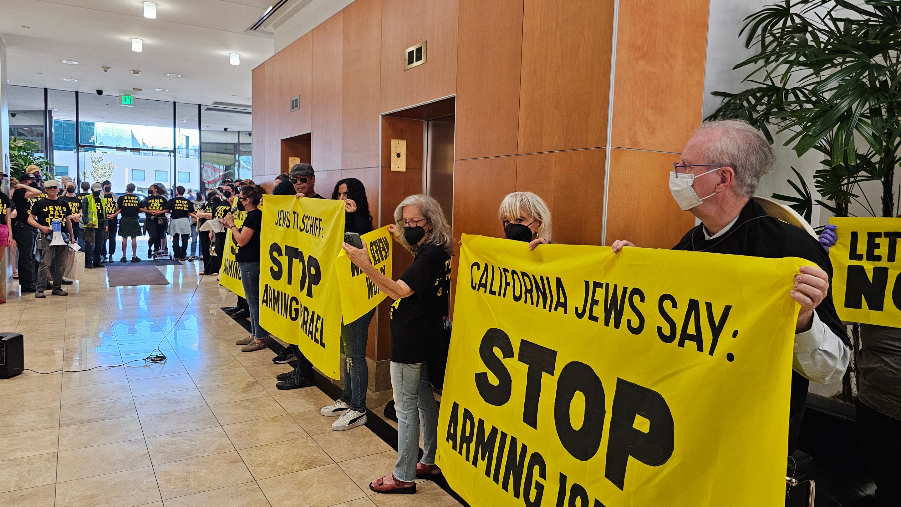 Demonstrators with Jewish Voices for Peace inside Adam Schiff's office in Burbank. Photo by Lexis-Olivier Ray for L.A. TACO.