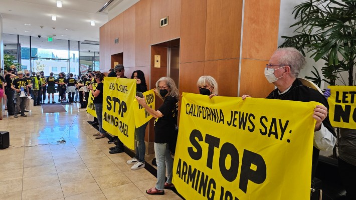 Demonstrators with Jewish Voices for Peace inside Adam Schiff's office in Burbank. Photo by Lexis-Olivier Ray for L.A. TACO.