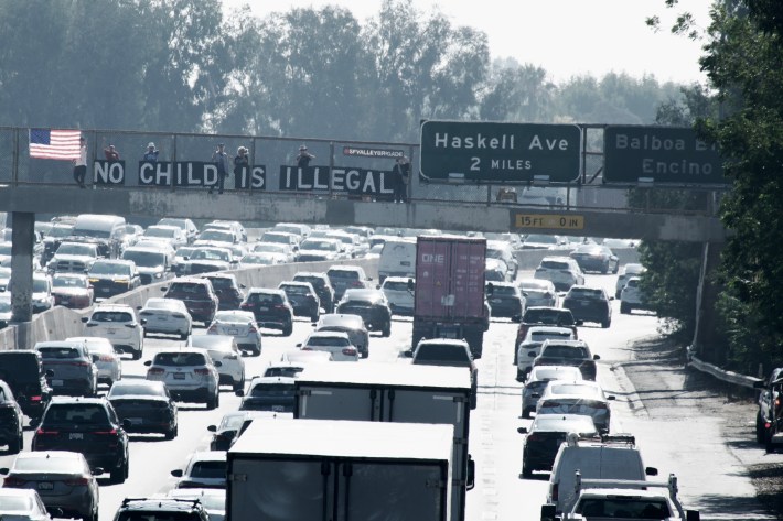 no child is illgal sign over the 101 freeway