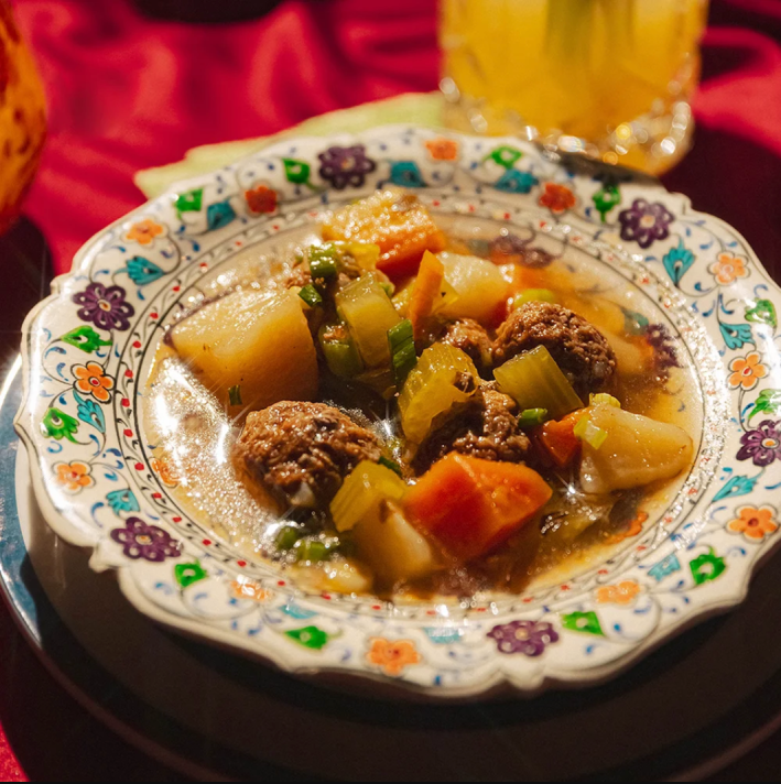 albondigas soup with carrots, celery and more.