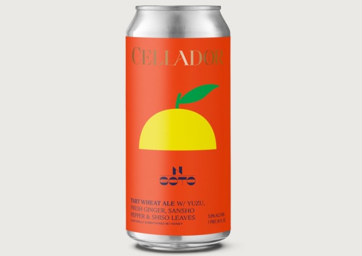 an orange can of N/Soto Tart Wheat Ale, which depicts a stylized version of a yuzu fruit on it. Photo via n/soto.