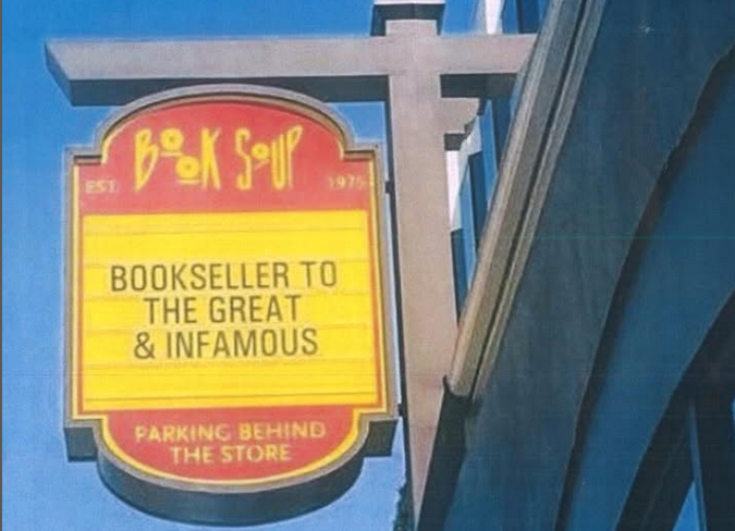 A sign for Book Soup attached to a building that says "Book Soup Bookseller To The Great & Infamous"