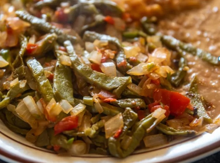 Nopales on beans with onions and chiles
