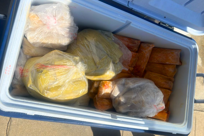 A cooler full of tamales packed up and ready to be sold