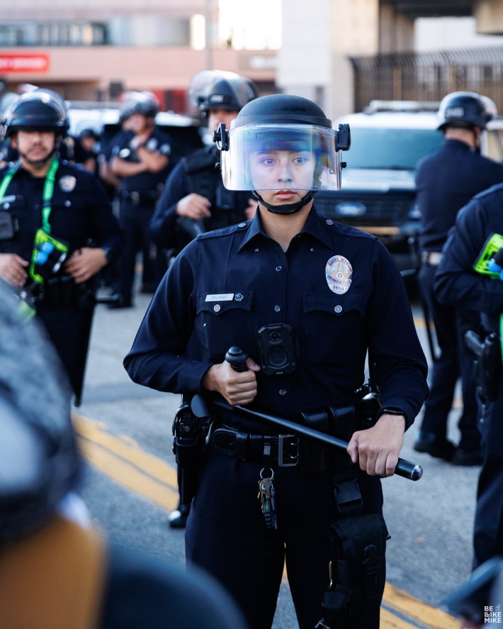 Police woman scared at No Kings in October.