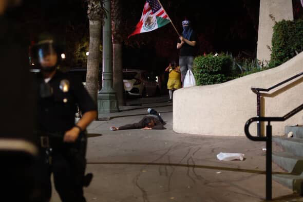 A limp body at No Kings in Downtown Los Angeles. A scared horse at No Kings. Photo by Jonas March for L.A. TACO.