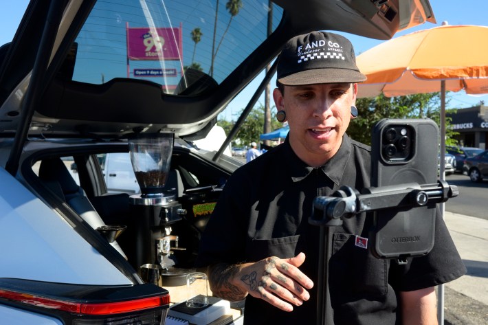 Daniel Arteaga livestreams on TikTok LIVE, speaking with fans about his espresso business. Photo by Isaac Ceja for L.A. TACO.
