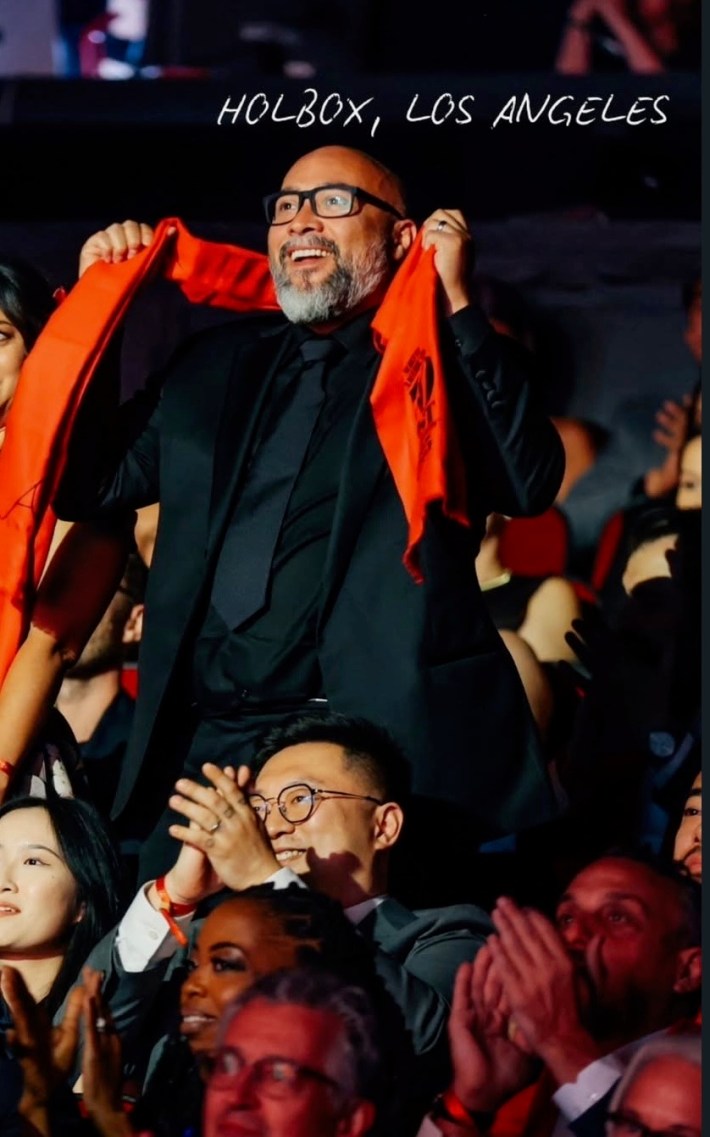 Gilberto Cetina rising to acknowledge his award when Holbox was called at the ceremony.