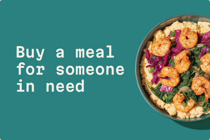 A green banner with a bowl of shrimp and grits that says "Buy a meal for someone in need"