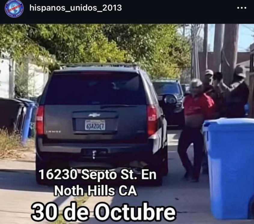 federal agents walking with a handcuffed senior in a North Hills alley