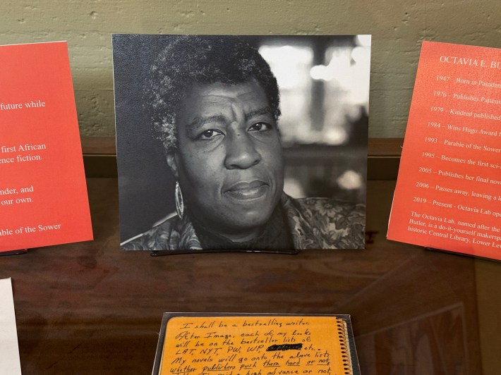 A photo of Octavia E. Butler on display at Los Angeles Central Library. Photo by Marina Watanabe for L.A. TACO.
