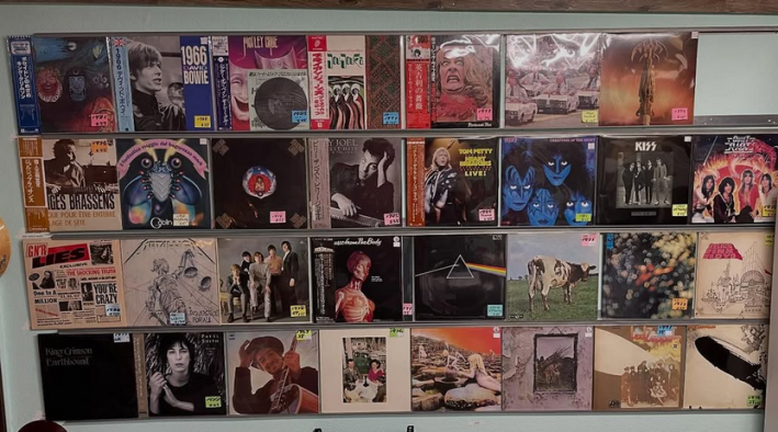 a wall of CDs on sale