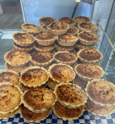 Rows of coconut tarts
